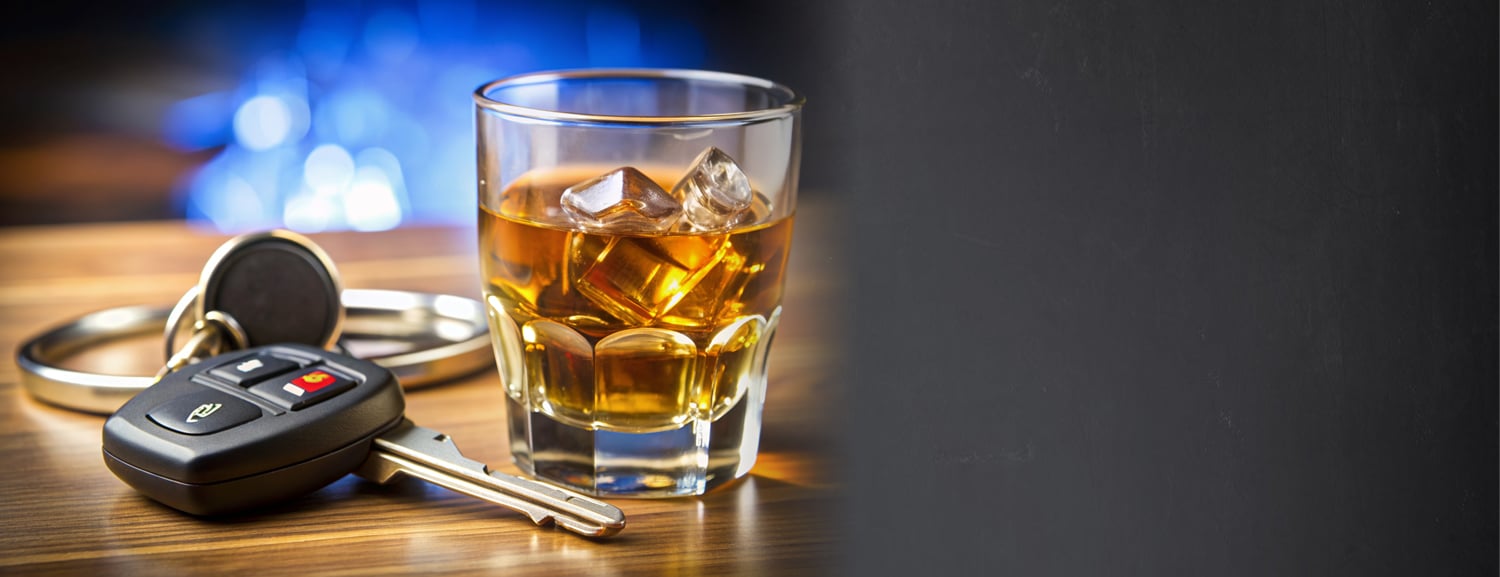 Car keys and a glass of whiskey